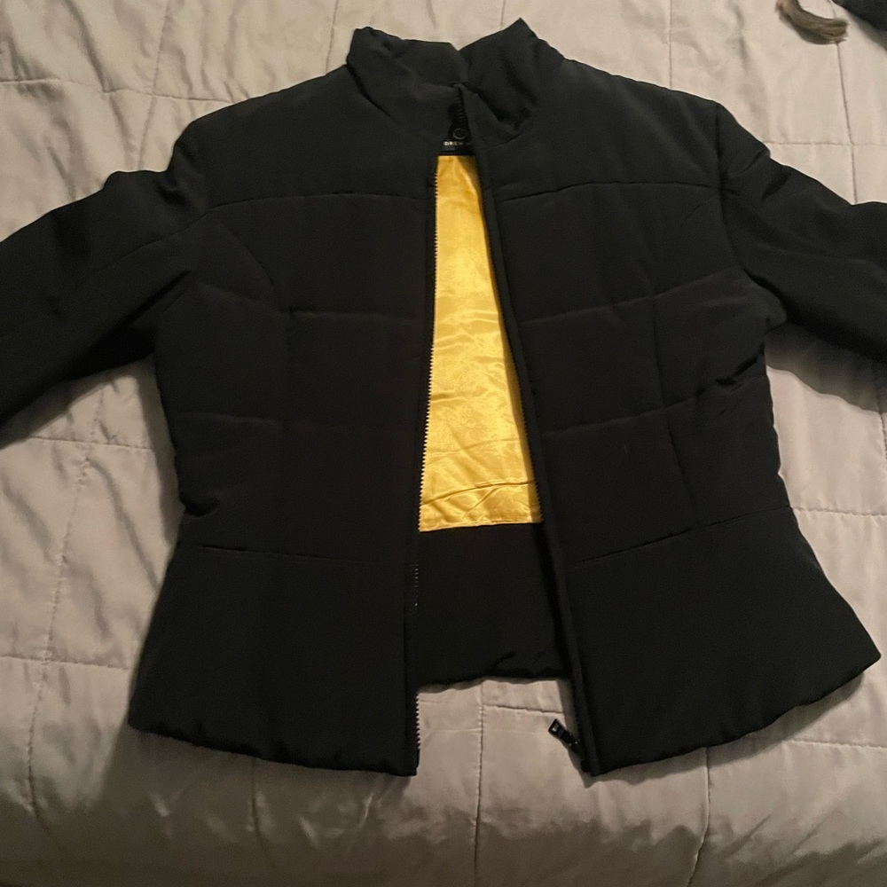 Black jacket. Women size Medium.